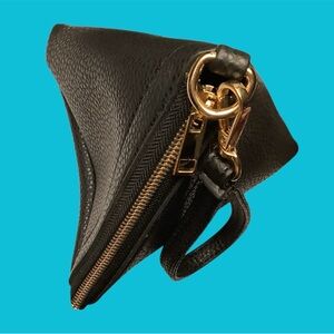 Chic Black Leather Pyramid Shaped Wristlet.
NEW!